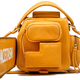 Illustration for article titled This Leather Chainsaw Bag Cuts Down Fashion Critics